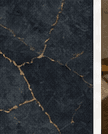 Close view of dark stone with warm mineral veining
